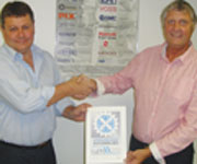 Russel Gill of SAFPA hands the certificate for Premium Hose Accreditation to Stuart Allan, Hyflo’s Hose and Fittings sales manager